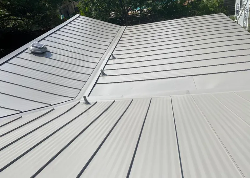 Solar attic fan installed on a metal roof for Roof Ventilation in Los Gatos